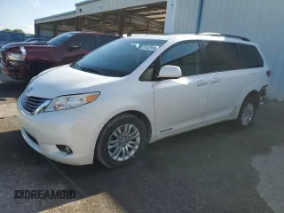 2015 Toyota Sienna XLE with VIN 5TDYK3DC0FS679812, listed as a Copart auction lot 61600775 with 118,483 mi miles and Salvage title. Bid and sale history available at DreamBid. Image 1.