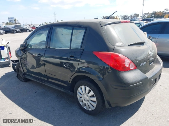 2012 Nissan Versa S with VIN 3N1BC1CPXCK250702, listed as a IAAI auction lot 41899436 with 136,378 mi miles. Bid and sale history available at carsss.com. Image 14.