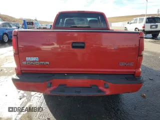 2000 GMC Sonoma SLS w/1SF Pkg with VIN 1GTCS1952Y8291772, listed as a Copart auction lot 83976484 with 127,849 mi miles and Salvage Title. Bid and sale history available at carsss.com. Image 6.