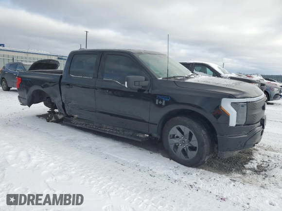 2024 Ford F-150 Lightning Flash with VIN 1FT6W3L76RWG12085, listed as a Copart auction lot 87181614 with 17,444 mi miles and Salvage title. Bid and sale history available at DreamBid. Image 4.
