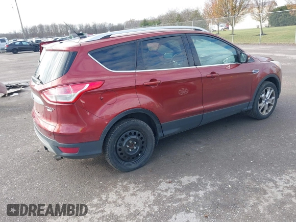 2015 Ford Escape Titanium with VIN 1FMCU9J91FUA26624, listed as a IAAI auction lot 40854175 with 132,313 mi miles. Bid and sale history available at carsss.com. Image 4.