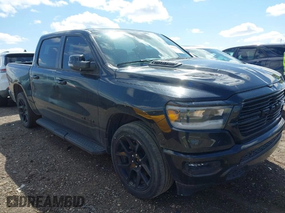 2023 Ram 1500 Laramie with VIN 1C6SRFJT6PN542105, listed as a IAAI auction lot 41974428 with 74,489 mi miles and . Bid and sale history available at DreamBid. Image 1.