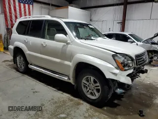 2004 Lexus GX 470 z VIN JTJBT20X240059501, wystawiony jako Copart lot #45146365 z przebiegiem 190 145 mil mil oraz Tytuł czysty. Historia ofert i sprzedaży dostępna na DreamBid. Obrazek 4.