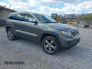 2011 Jeep Grand Cherokee Overland Summit with VIN 1J4RR6GT7BC694164, listed as a IAAI auction lot 41876385 with 164,055 mi miles. Bid and sale history available at carsss.com. Image 1.
