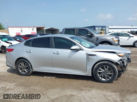 2019 Kia Optima LX z VIN 5XXGT4L37KG281329, wystawiony jako IAAI lot #42434855 z przebiegiem 113 448 mil mil oraz . Historia ofert i sprzedaży dostępna na DreamBid. Obrazek 13.