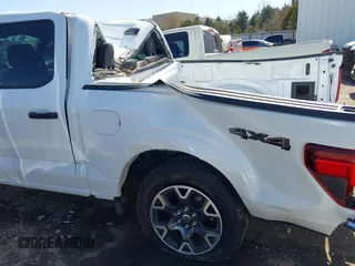 2024 Ford F-150 STX with VIN 1FTFW2L51RKF56802, listed as a IAAI auction lot 41771803 with 5,643 mi miles and . Bid and sale history available at carsss.com. Image 6.