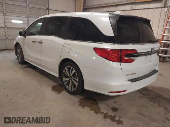 2021 Honda Odyssey Touring with VIN 5FNRL6H80MB026908, listed as a IAAI auction lot 41564765 with 116,453 mi miles. Bid and sale history available at carsss.com. Image 3.