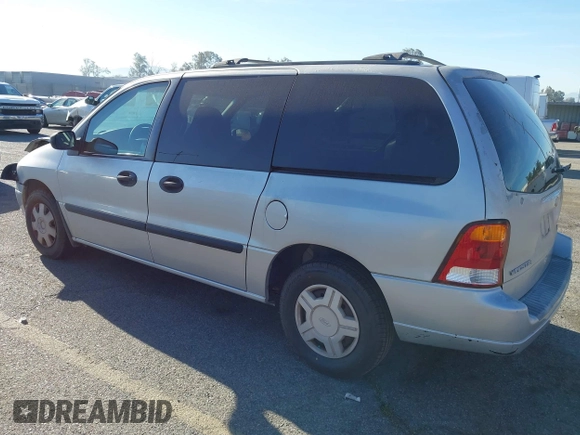 2003 Ford Windstar LX with VIN 2FMZA51413BA16113, listed as a IAAI auction lot 41850359 with 128,768 mi miles and . Bid and sale history available at DreamBid. Image 3.