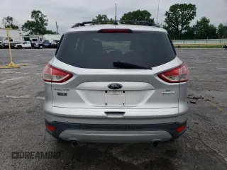 2013 Ford Escape SE with VIN 1FMCU0GX7DUB00465, listed as a Copart auction lot 58265705 with 227,613 mi miles and Salvage title. Bid and sale history available at DreamBid. Image 6.