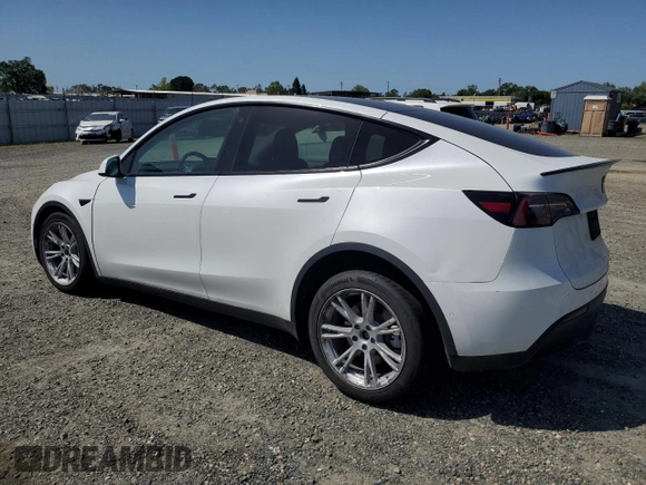 2022 Tesla Model Y Long Range z VIN 7SAYGAEE6NF492070, wystawiony jako Copart lot #52032415 z przebiegiem 143 732 mil mil oraz Szkody całkowita. Historia ofert i sprzedaży dostępna na DreamBid. Obrazek 2.