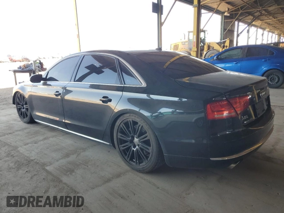 2011 Audi A8 z VIN WAURVAFD5BN019557, wystawiony jako Copart lot #54801035 z przebiegiem 148 688 mil mil oraz Tytuł czysty. Historia ofert i sprzedaży dostępna na DreamBid. Obrazek 2.