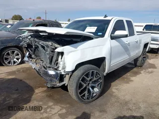 2018 Chevrolet Silverado 1500 LT with VIN 1GCRCREC2JZ361099, listed as a IAAI auction lot 41306266 with 121,924 mi miles and . Bid and sale history available at DreamBid. Image 2.