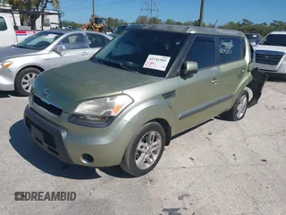 2011 Kia Soul + with VIN KNDJT2A21B7256665, listed as a IAAI auction lot 41741905 with 56,312 mi miles. Bid and sale history available at carsss.com. Image 2.