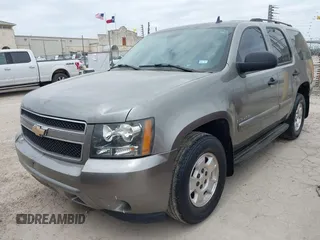 2007 Chevrolet Tahoe LS with VIN 1GNFC13C57R401893, listed as a IAAI auction lot 42046960 with 258,231 mi miles and . Bid and sale history available at DreamBid. Image 2.