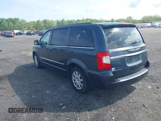 2014 Chrysler Town & Country Touring with VIN 2C4RC1BG0ER461081, listed as a IAAI auction lot 42157023 with 220,955 mi miles. Bid and sale history available at carsss.com. Image 3.