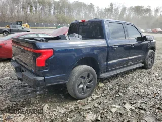2023 Ford F-150 Lightning Pro z VIN 1FT6W1EV2PWG06829, wystawiony jako Copart lot #45875915 z przebiegiem 30 021 mil mil oraz Szkoda całkowita • Salvage title. Historia ofert i sprzedaży dostępna na DreamBid. Obrazek 3.