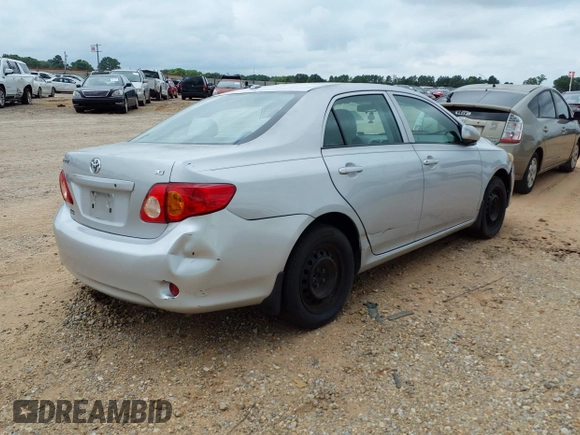 2009 Toyota Corolla with VIN 1NXBU40E49Z086415, listed as a IAAI auction lot 39773955 with 203,803 mi miles and . Bid and sale history available at DreamBid. Image 4.