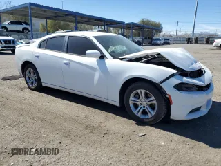 2015 Dodge Charger SE with VIN 2C3CDXBG2FH867283, listed as a Copart auction lot 47313835 with 124,448 mi miles and Salvage Title. Bid and sale history available at carsss.com. Image 4.
