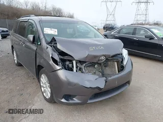 2014 Toyota Sienna LE with VIN 5TDJK3DC1ES087626, listed as a IAAI auction lot 41610813 with 142,311 mi miles and . Bid and sale history available at DreamBid. Image 6.