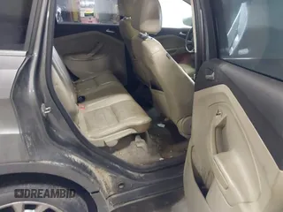 2014 Ford Escape Titanium with VIN 1FMCU9J90EUC31625, listed as a IAAI auction lot 41492075 with 301,917 mi miles and . Bid and sale history available at DreamBid. Image 8.