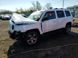 2014 Jeep Patriot Latitude z VIN 1C4NJPFAXED823045, wystawiony jako Copart lot #54331435 z przebiegiem 144 708 mil mil oraz Szkoda całkowita • Salvage title. Historia ofert i sprzedaży dostępna na DreamBid. Obrazek 1.
