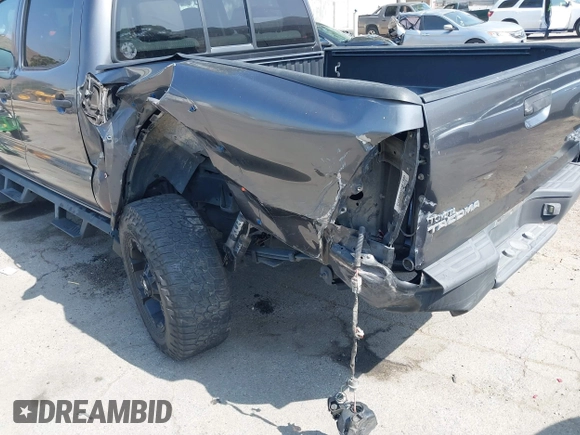 2013 Toyota Tacoma PreRunner z VIN 5TFJX4GN2DX018800, wystawiony jako IAAI lot #42304447 z przebiegiem 188 409 mil mil oraz . Historia ofert i sprzedaży dostępna na DreamBid. Obrazek 18.