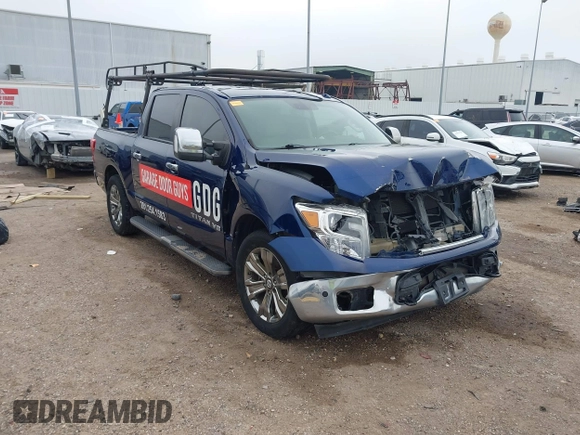 2018 Nissan Titan SV with VIN 1N6AA1E69JN500096, listed as a IAAI auction lot 41883390 with 136,752 mi miles and . Bid and sale history available at DreamBid. Image 1.