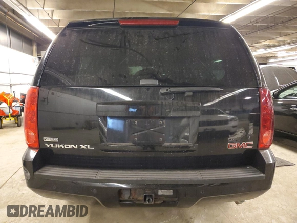 2007 GMC Yukon XL SLT z VIN 1GKFK16377J349144, wystawiony jako Copart lot #84300374 z przebiegiem Nie podano mil oraz Szkoda całkowita • Salvage title. Historia ofert i sprzedaży dostępna na DreamBid. Obrazek 6.