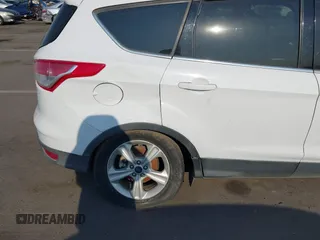 2016 Ford Escape SE z VIN 1FMCU0GXXGUC13444, wystawiony jako IAAI lot #39566364 z przebiegiem 162 059 mil mil oraz . Historia ofert i sprzedaży dostępna na DreamBid. Obrazek 6.