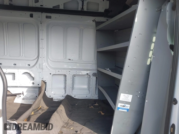 2021 Ford Transit Cargo z VIN 1FTBR3X82MKA18067, wystawiony jako IAAI lot #41205233 z przebiegiem 48 391 mil mil oraz . Historia ofert i sprzedaży dostępna na DreamBid. Obrazek 8.