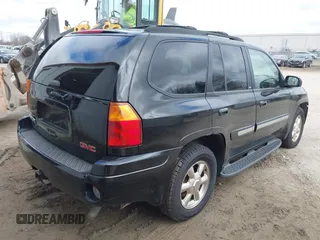 2002 GMC Envoy SLT with VIN 1GKDT13S622506181, listed as a IAAI auction lot 41986061 with 212,583 mi miles. Bid and sale history available at carsss.com. Image 4.