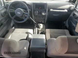 2007 Jeep Wrangler Unlimited X with VIN 1J8GB39157L142982, listed as a Copart auction lot 82050134 with 72,666 mi miles and Salvage Title. Bid and sale history available at DreamBid. Image 8.