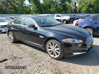 2015 Jaguar XF V6 Portfolio with VIN SAJWJ0FFXF8U60040, listed as a Copart auction lot 52912695 with 112,618 mi miles and Salvage Title. Bid and sale history available at carsss.com. Image 4.