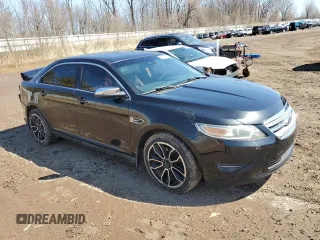 2011 Ford Taurus Limited with VIN 1FAHP2JW0BG140708, listed as a Copart auction lot 52157335 with 141,229 mi miles and Clean title. Bid and sale history available at DreamBid. Image 4.