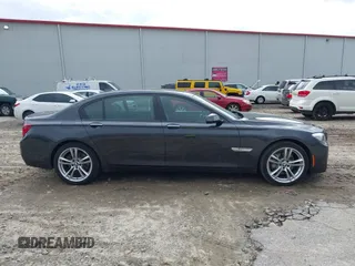 2014 BMW 7 Series 740Li with VIN WBAYE4C56ED138397, listed as a IAAI auction lot 41726117 with 116,291 mi miles. Bid and sale history available at carsss.com. Image 13.