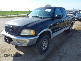 1997 Ford F-150 XL with VIN 1FTDX18W6VKD46643, listed as a IAAI auction lot 42111129 with 107,025 mi miles. Bid and sale history available at carsss.com. Image 2.