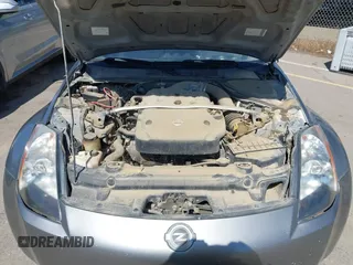 2005 Nissan 350Z 35th Anniversary Edition z VIN JN1AZ34D15M608766, wystawiony jako IAAI lot #41852248 z przebiegiem 261 809 mil mil oraz . Historia ofert i sprzedaży dostępna na DreamBid. Obrazek 10.