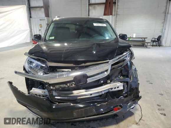 2021 Honda Pilot Touring 7-Passenger z VIN 5FNYF6H62MB079918, wystawiony jako Copart lot #53272865 z przebiegiem 29 581 mil mil oraz Szkoda całkowita • Salvage title. Historia ofert i sprzedaży dostępna na DreamBid. Obrazek 5.