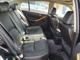 2004 Infiniti G35 w/Leather z VIN JNKCV51F34M708688, wystawiony jako Copart lot #59127945 z przebiegiem 199 727 mil mil oraz Szkoda całkowita • Salvage title. Historia ofert i sprzedaży dostępna na DreamBid. Obrazek 10.