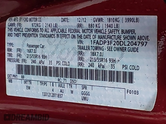 2013 Ford Focus SE with VIN 1FADP3F20DL204797, listed as a IAAI auction lot 41404937 with 146,643 mi miles. Bid and sale history available at carsss.com. Image 9.