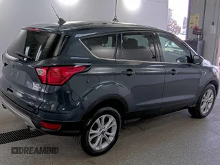 2019 Ford Escape SE z VIN 1FMCU9GD9KUA54757, wystawiony jako IAAI lot #42516631 z przebiegiem 87 040 mil mil oraz . Historia ofert i sprzedaży dostępna na DreamBid. Obrazek 34.