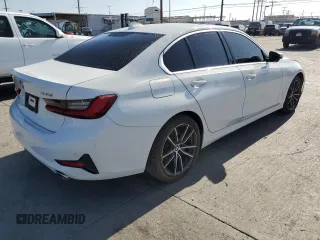 2019 BMW 3 Series 330i with VIN WBA5R1C57KAK09173, listed as a Copart auction lot 57803915 with 89,043 mi miles and Salvage title. Bid and sale history available at DreamBid. Image 3.
