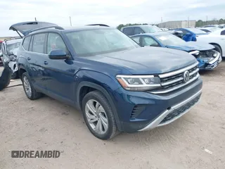 2021 Volkswagen Atlas SE z VIN 1V2JR2CA3MC555490, wystawiony jako IAAI lot #41286240 z przebiegiem 89 435 mil mil oraz . Historia ofert i sprzedaży dostępna na DreamBid. Obrazek 1.