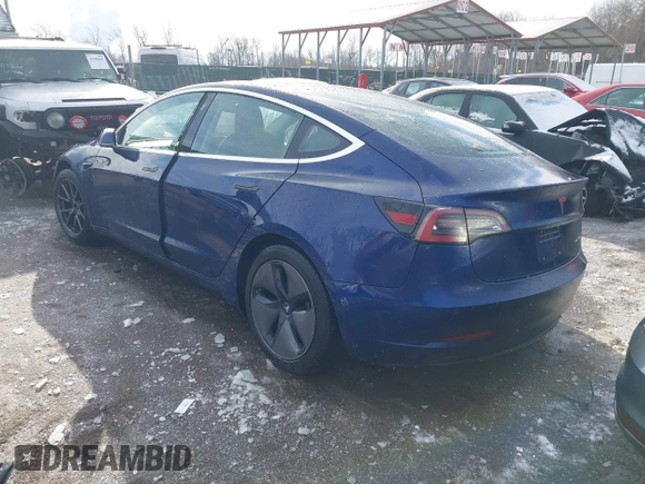 2018 Tesla Model 3 Long Range Battery with VIN 5YJ3E1EB8JF115138, listed as a IAAI auction lot 41343399 with 62,351 mi miles and . Bid and sale history available at DreamBid. Image 3.