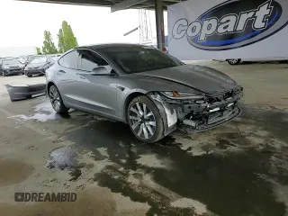 2024 Tesla Model 3 z VIN 5YJ3E1EA0RF859934, wystawiony jako Copart lot #52962285 z przebiegiem 32 329 mil mil oraz Szkoda całkowita • Salvage title. Historia ofert i sprzedaży dostępna na DreamBid. Obrazek 14.