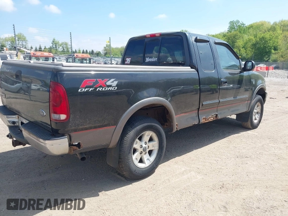 2002 Ford F-150 XL with VIN 1FTRX18L82NA18808, listed as a IAAI auction lot 42259883 with 154,519 mi miles and . Bid and sale history available at DreamBid. Image 4.