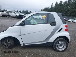 2012 Smart fortwo Pure with VIN WMEEJ3BA3CK573365, listed as a IAAI auction lot 41910721 with Not Provided miles and . Bid and sale history available at DreamBid. Image 14.