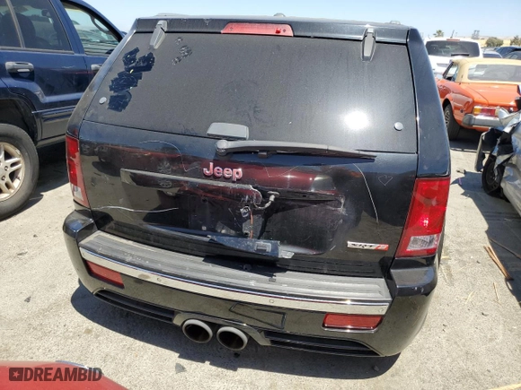 2007 Jeep Grand Cherokee SRT-8 with VIN 1J8HR78387C603473, listed as a Copart auction lot 57712964 with 114,429 mi miles and Salvage Title. Bid and sale history available at carsss.com. Image 6.
