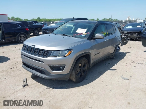 2018 Jeep Compass Latitude with VIN 3C4NJDBB3JT304145, listed as a IAAI auction lot 42008241 with 52,642 mi miles and . Bid and sale history available at DreamBid. Image 2.