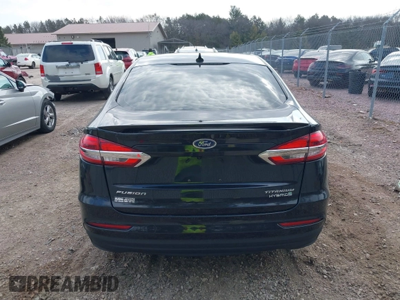 2019 Ford Fusion Hybrid Titanium with VIN 3FA6P0RU4KR144445, listed as a IAAI auction lot 42059840 with 90,617 mi miles. Bid and sale history available at carsss.com. Image 17.